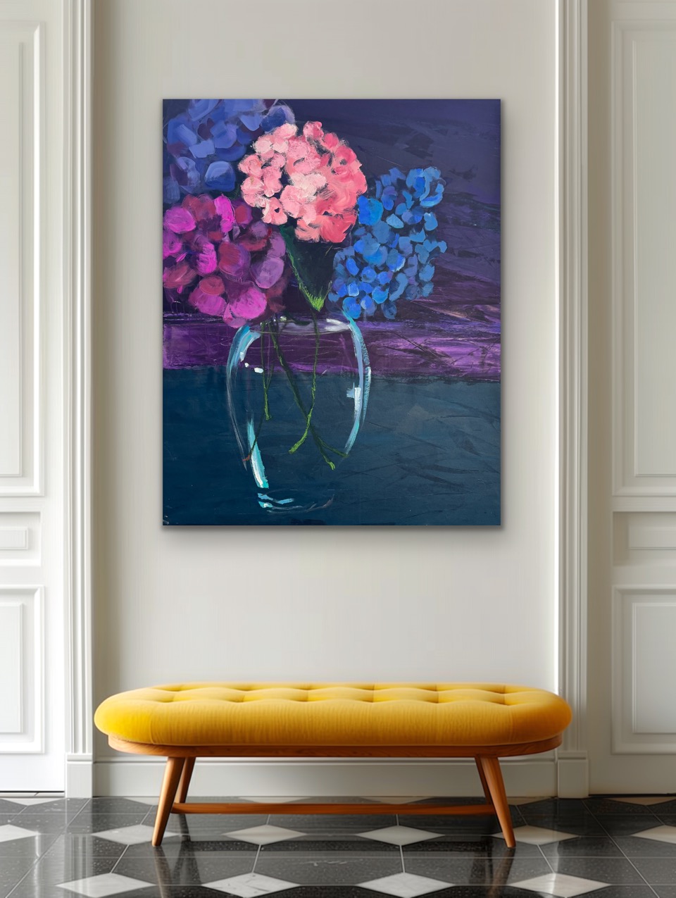 Painting of pink, purple, and blue flowers in a glass vase on a dark background, hung on a white wall.