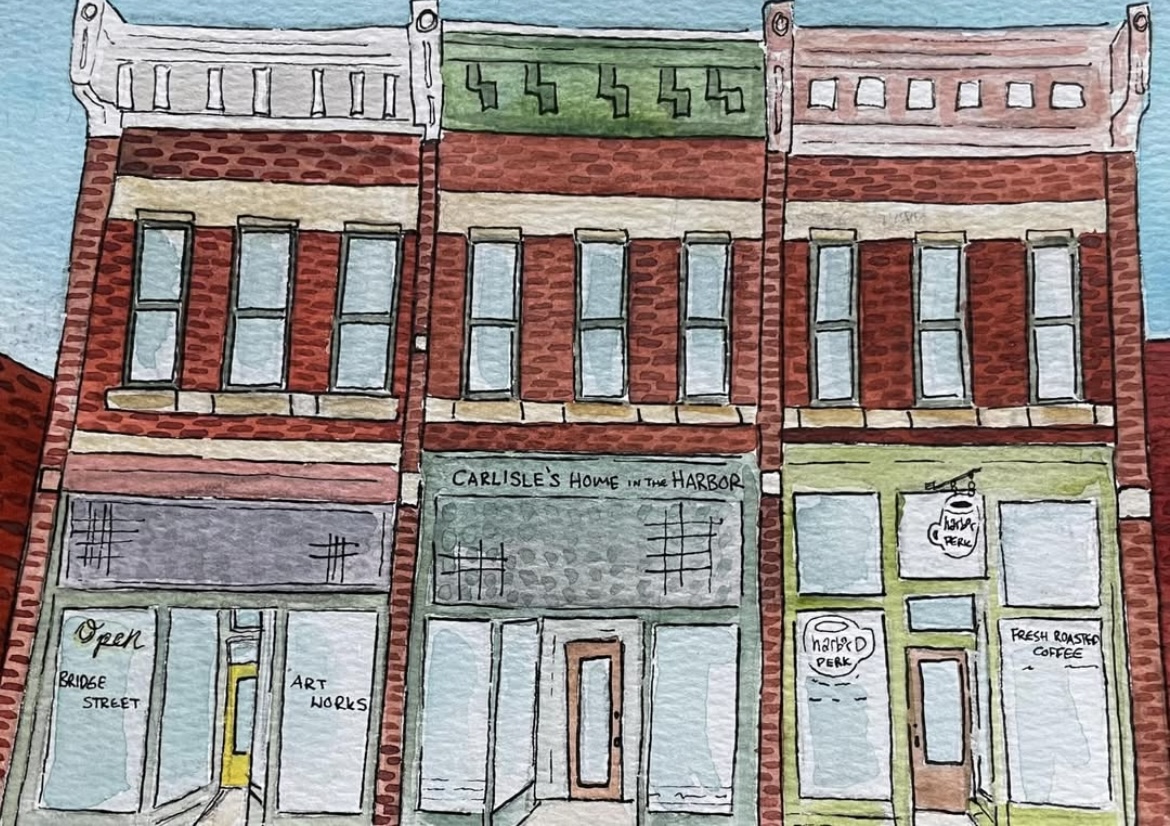 Colorful drawing of a row of buildings with storefronts and decorative upper facades, including a bakery and a cafe.