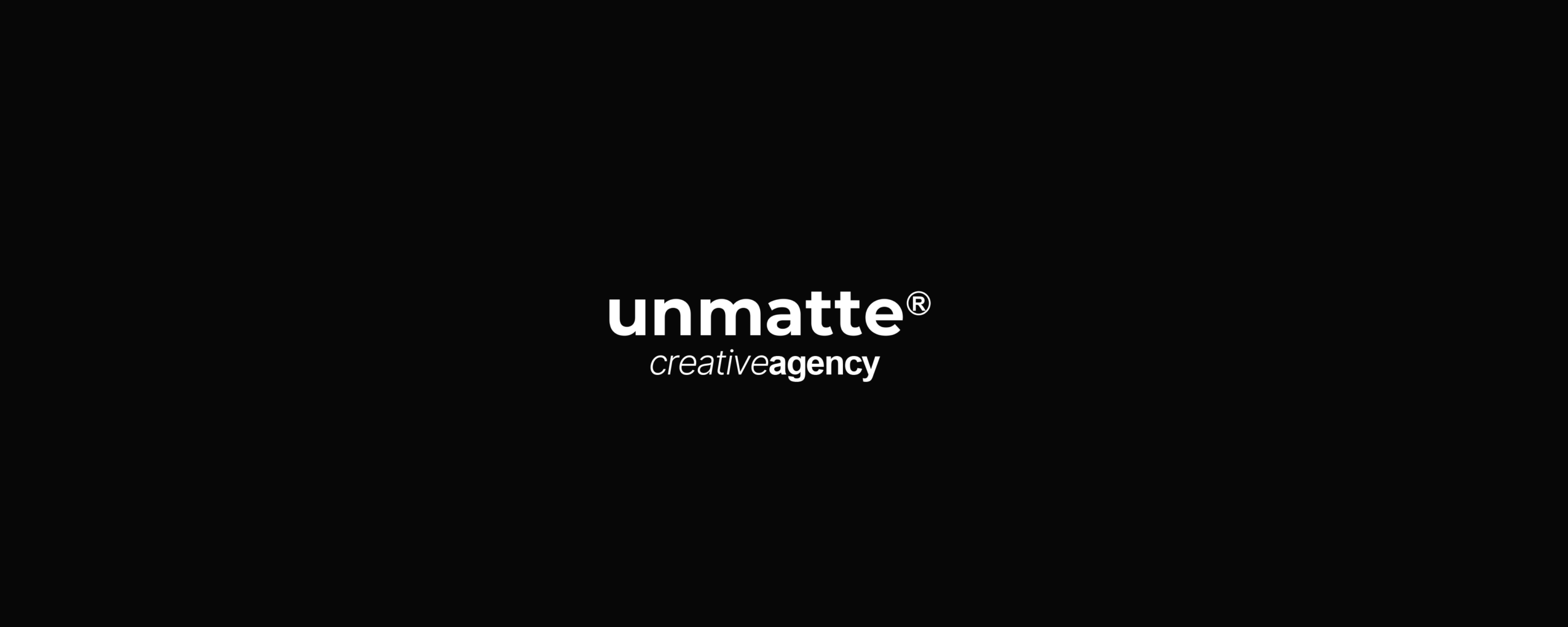 Black background with white text reading 'unmatte creative agency'.