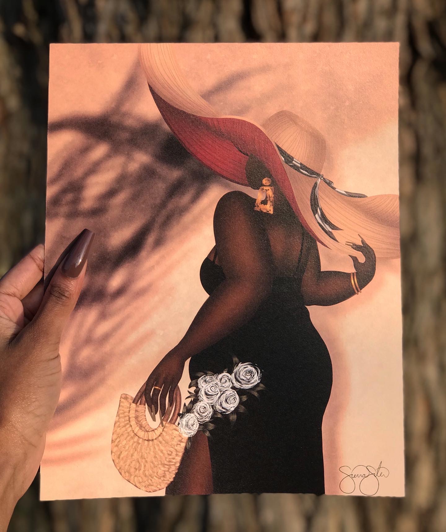 Silhouette of a woman in a black dress holding a bouquet of white roses and a woven handbag, with a pink background.