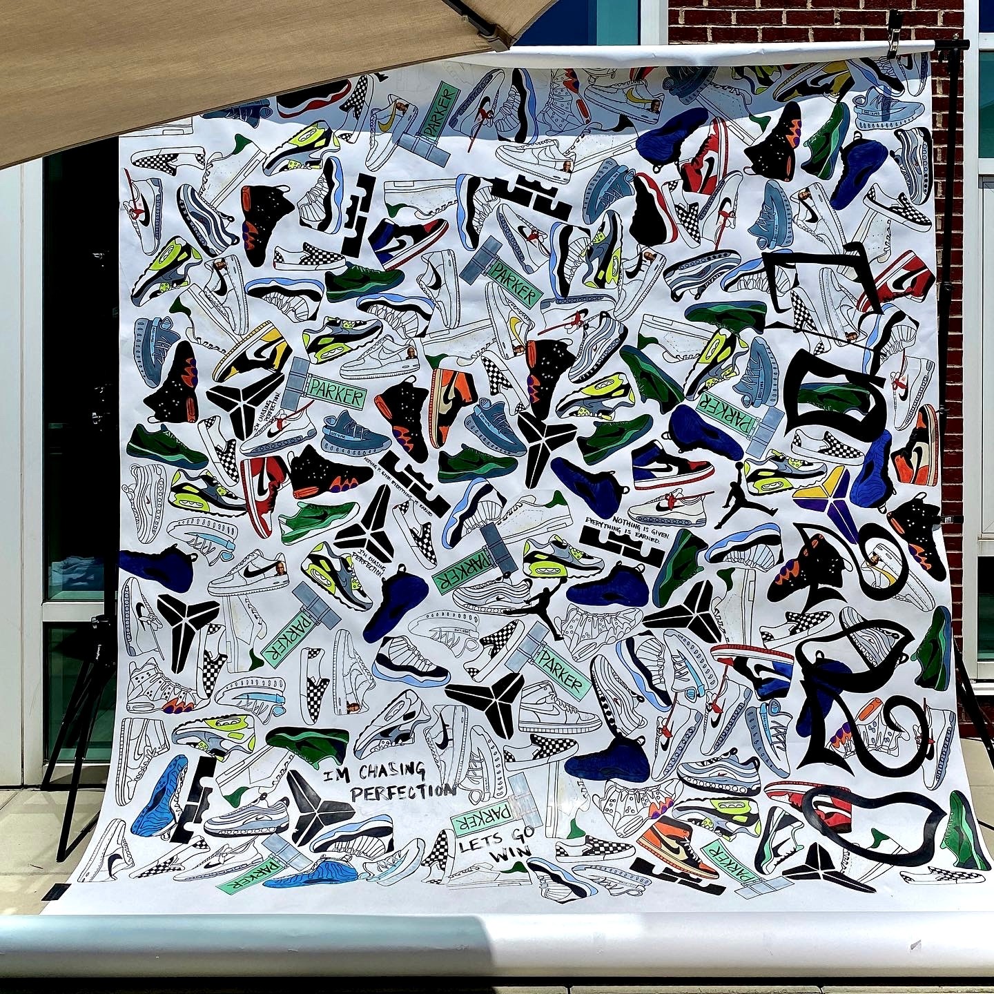 A colorful collage of various shoes and footwear designs on a white background.