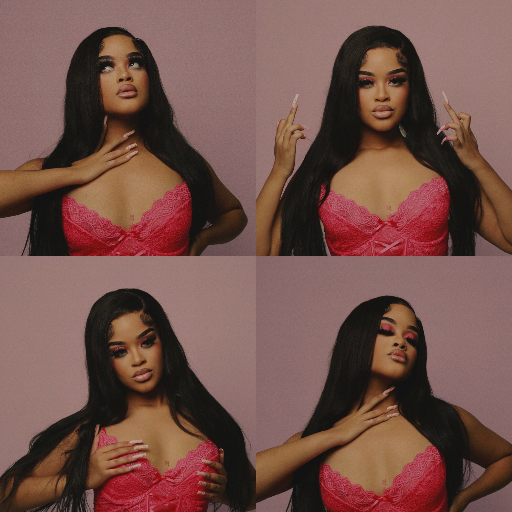Two women with long black hair in pink tops, posing against a pink background, with one touching her neck and the other making peace signs.