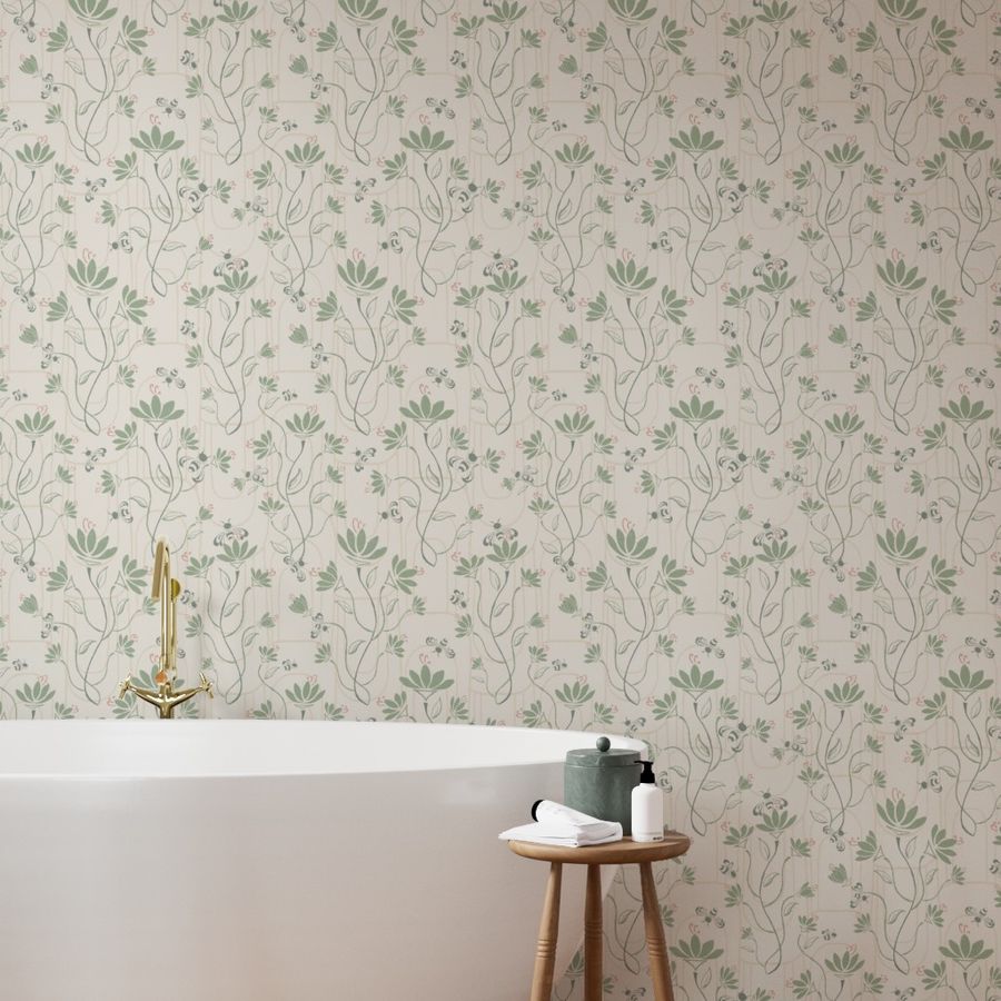Bathroom with floral wallpaper, bathtub, and a small wooden table holding toiletries.