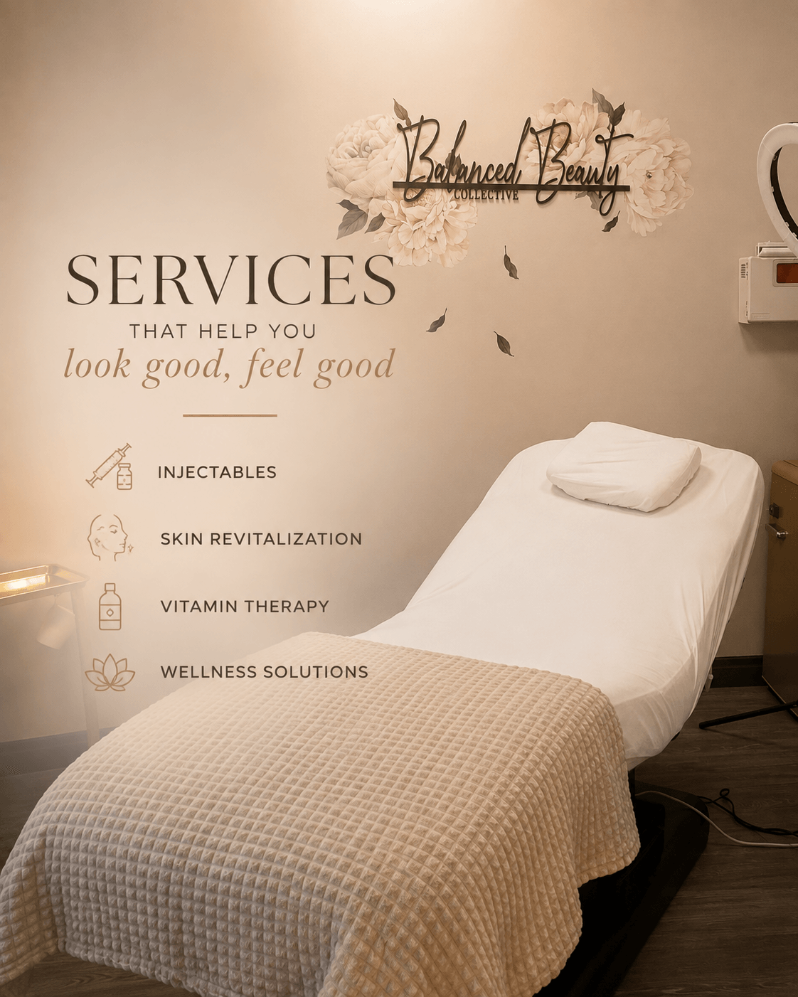 Treatment bed with a pillow in a wellness clinic room, wall with service list and decorative sign, warm lighting.