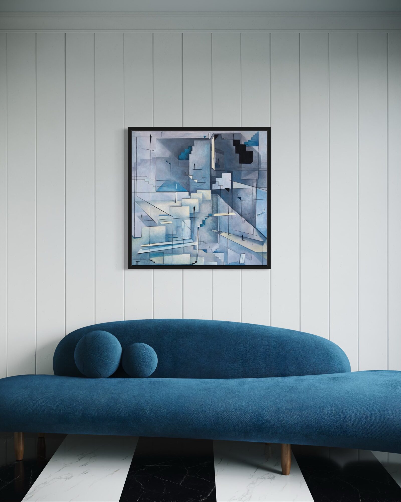 Blue sofa beneath a framed abstract painting on a paneled wall.